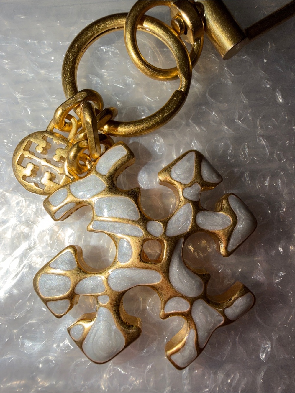 Tory Burch Gold-Tone Keychain with White Enamel Logo Charm - Picture 3 of 3